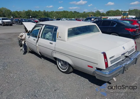 1984 Oldsmobile 98 Regency z USA, uszkodzony, nr VIN 1G3AG69Y2EM860977